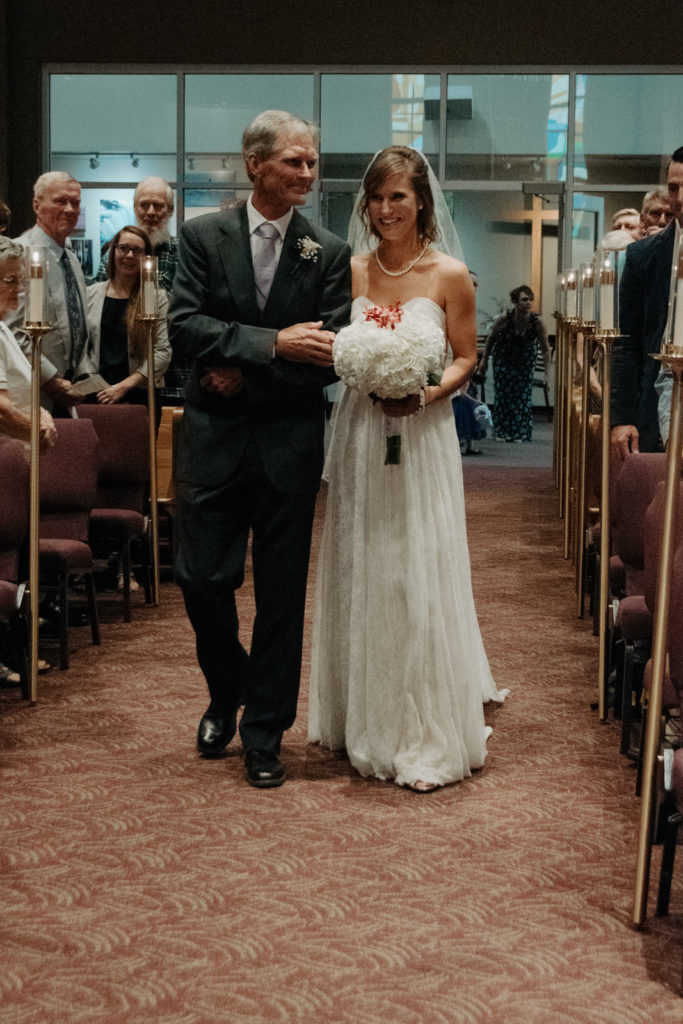 Dad walks bride down the aisle