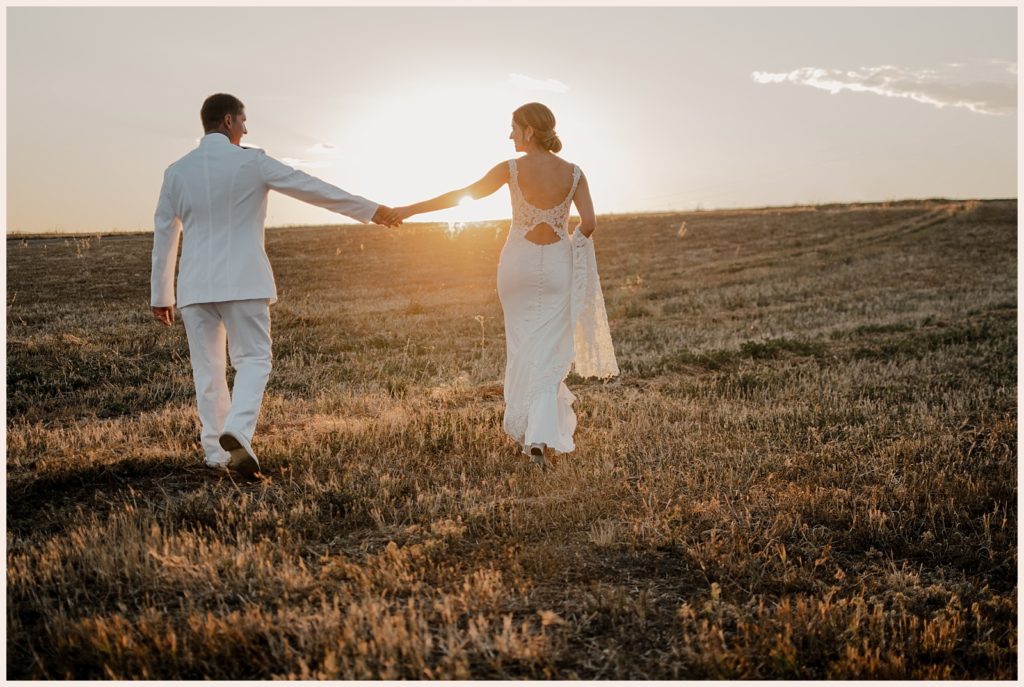 Sunset portraits of couple at backyard wedding in Colorado