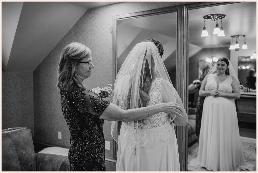 Mom puts veil on bride at Brookside Gardens wedding 
